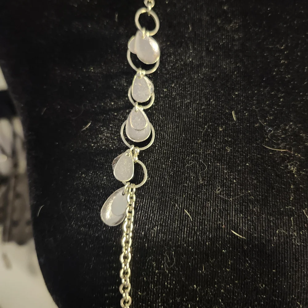 Elegant Silver Necklace with Charms